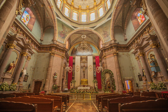 Interior of a Mexican Catholic church, with history and artistic paintings