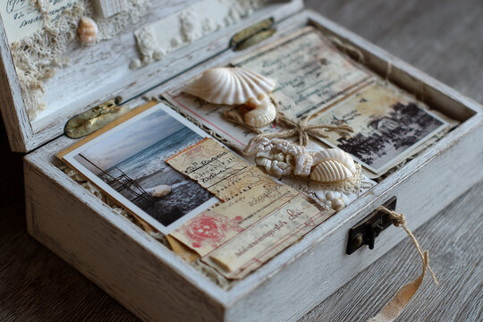 Vintage memory collage box with old photos and letters