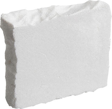 Thick white polystyrene foam block fragment with porous texture and rough cut edges for material samples or insulation concepts isolated on a transparent background