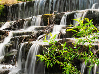 Waterfall cascades over rocks  © Angela