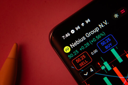 Dhaka, Bangladesh- 08 Sep 2025: Close-up of a phone screen showing Nebius Group stock market data with a candlestick chart.