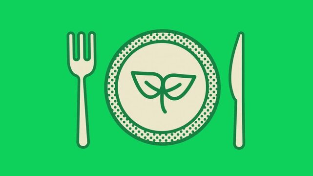 fork and knife on green plate