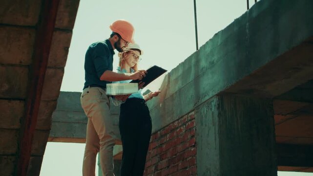Discussing Construction Project at Building Site. Development Process and Architecture Management