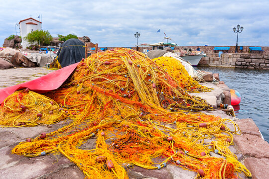 Traditional Fishing Nets on Stone Pier in Skala Sikamineas, Lesvos