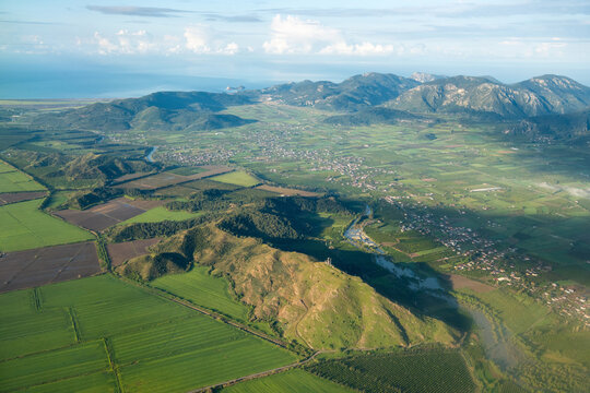 Aerial View of Dalaman Valley in Mugla, Turkey. View with the Dalaman Stream, Akinci and Fevziye settlements, and Mediterranean Coast.