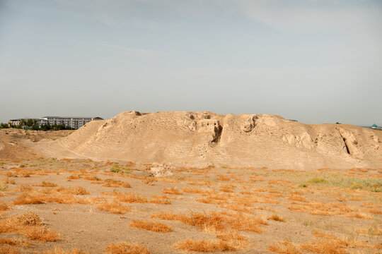Panorama of Afrasiyab, most ancient place in Samarkand, Uzbekistan. What appears to be hill on left is former fortress and palace, founded in VII BC. Contours of walls and gate are still visible