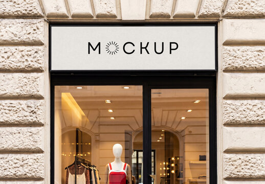 Luxury Boutique Shop Front Mockup with Blank Horizontal Signboard Above Glass Entrance for Brand Identity Display