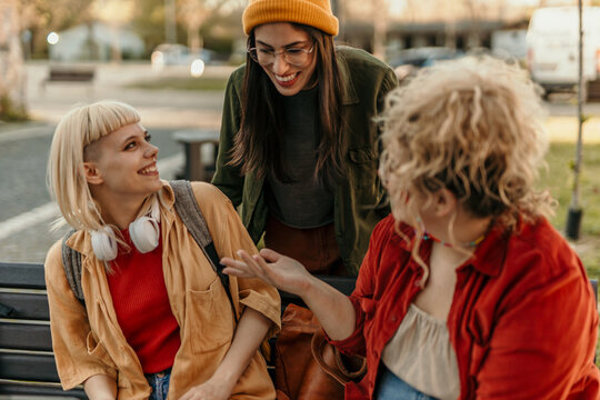 Diverse friends enjoying outdoor conversation and togetherness