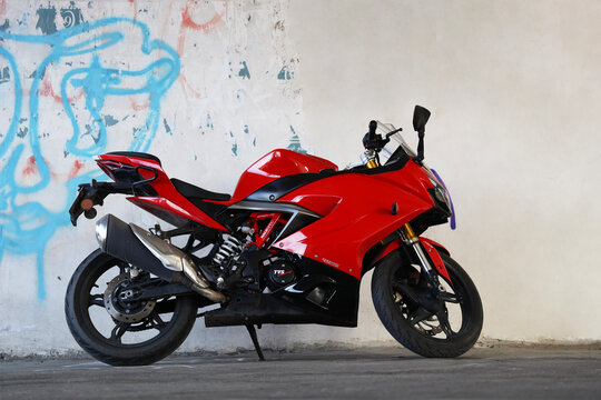 Tbilisi, Georgia - May 08, 2026: Tvs apache rr 310 Racing red motorcycle at Outside street RR310