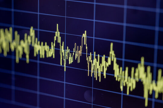 Close up of oscilloscope measuring electronic frequency