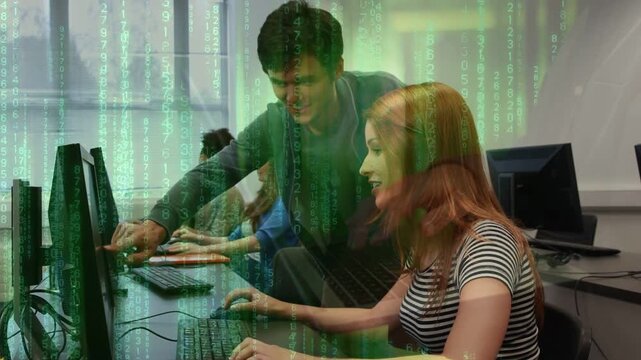 Tutor leaning over guiding student typing at monitor in computer lab, green binary overlay pulsing