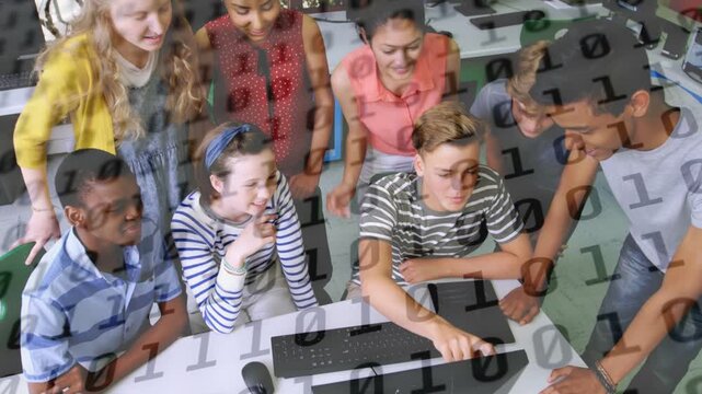 Teen boy typing and clicking in lab, peers pointing to see result while binary overlay reacting