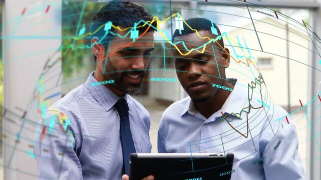 Two men examining tablet pointing and activating candlestick charts and labels for market analysis