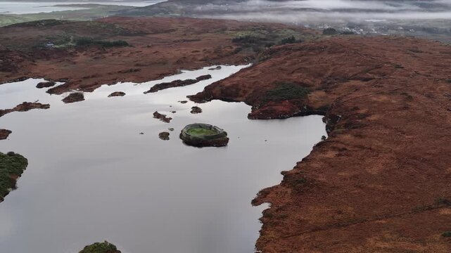 Aerial of the historic Ringfort at Lough Doon, Portnoo, County Donegal, Ireland