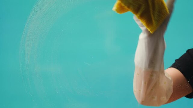 Cleaning service, Close up of woman cleaning table at home with spray. Homework, clean of ditry kitchen table with surface cleaner spray, cleaner spray, household clean chroma key green screen