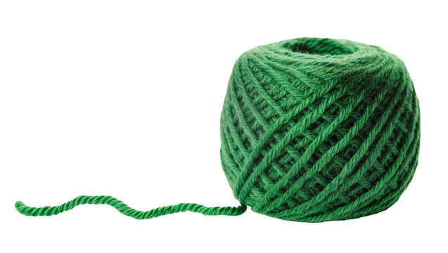 Isolated green ball of thick yarn with a trailing string, perfect for craft projects