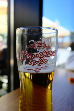 Valjevo, Serbia &ndash; April 4, 2026 &ndash; Valjevsko pivo beer glass close-up on table