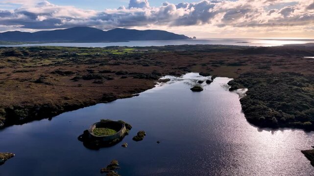 Aerial of the historic Ringfort at Lough Doon, Portnoo, County Donegal, Ireland