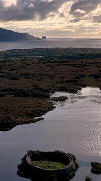 Aerial of the historic Ringfort at Lough Doon, Portnoo, County Donegal, Ireland