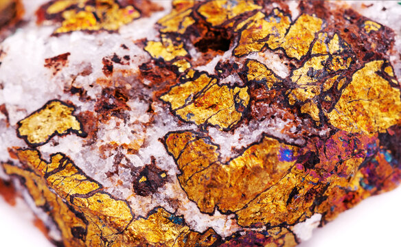 Macro view of raw chalcopyrite ore with metallic golden surface, natural gemstone crystal