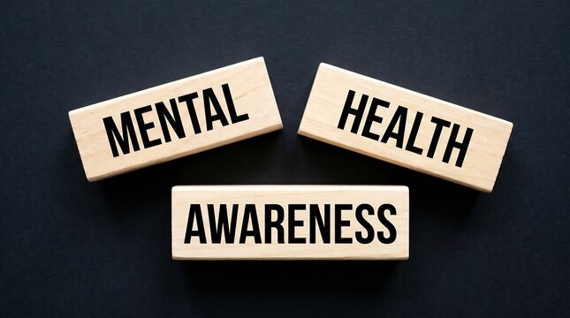 Wooden blocks spelling out mental health awareness