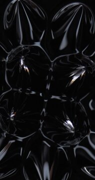 Vertical video background, magnetic substance. Magnetic fluid. Ferrofluid. Black liquid surface. Abstract background.