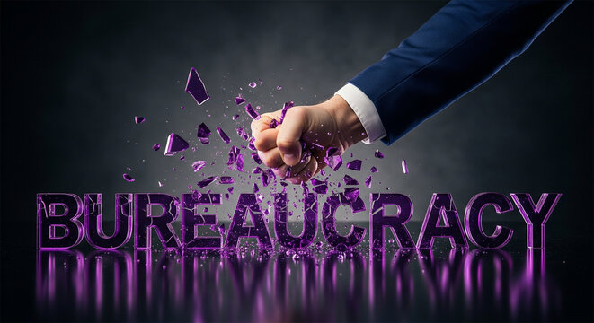 Bureaucracy word being smashed by a businessman fist, conceptual image of breaking red tape, overcoming corporate obstacles and administrative barriers
