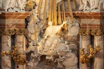 Obraz premium Vienna, Austria. Baroque sculpture detail with angels and clouds in Karlskirche altar