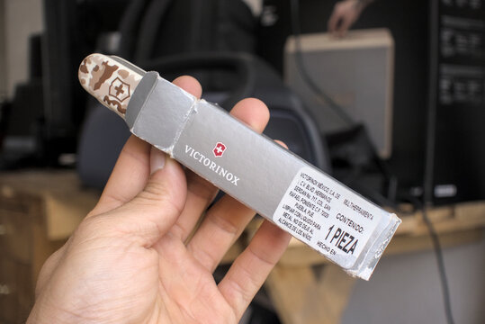 Zapopan Jalisco, Mexico - May 7, 2026:Victorinox Huntsman multi-tool with desert camouflage, victorinox knife concept