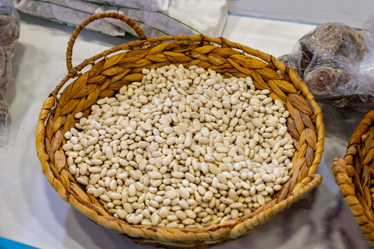 Mix dry fruit sale in the market . Karisik cerez. Vibrant dried fruits and nuts at a market stall. A variety of nuts at a street market in plastic conA lot of almonds in box on sale at farms market, s
