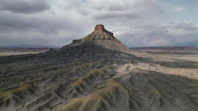 Dramatic scenery drone footage of footage of Factory Butte in Utah , otherworldly landscape with unique rock formations. Tourist attraction, landmark
