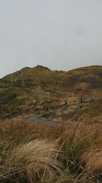 Tourists in mountains - scotland highland, UK