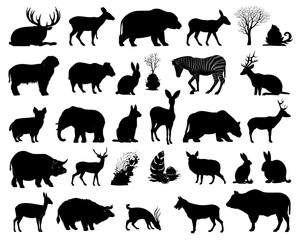 Naklejka premium A collection of wildlife animal silhouettes in a black and white illustration showing an assortment of mammals in diverse poses and forms.