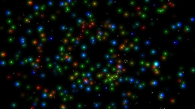 Colorful glowing tiny light particles random movement animation on black background