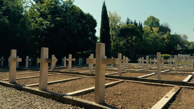 Military Cemetery With White Cross Headstones