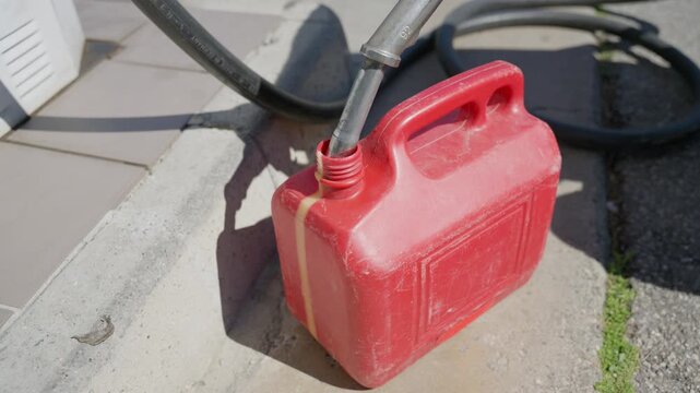 filling up with gasoline at gas station 