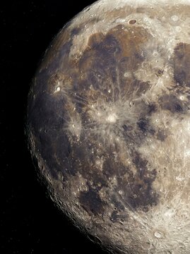 Moon with cratered terrain in space