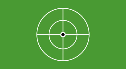 Target symbol on green background, focus and aim concept © Sari