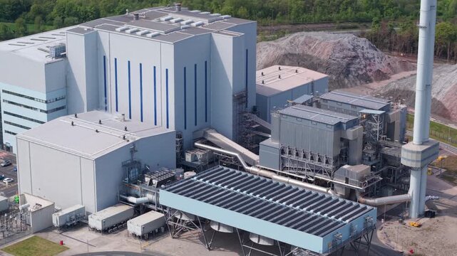 Aerial view of Enfinium 1 and 2 Ferrybridge waste-to-energy facility with industrial structures and cooling systems in Knottingley, England, United Kingdom.