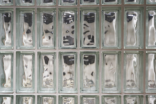 Translucent glass block wall, muted industrial aesthetic