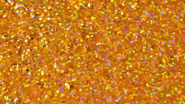  shimmering shimmer of golden glitter. Glittery Christmas wallpaper. 4k footage