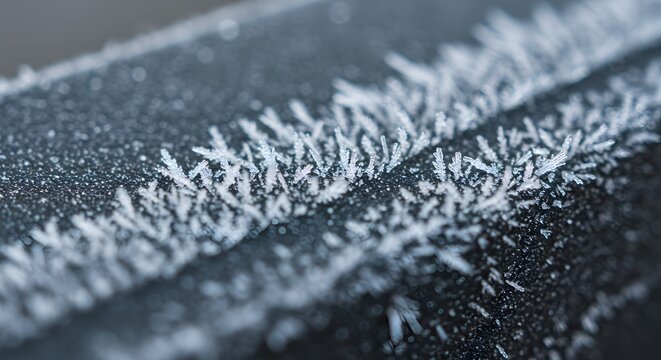Frosty surface with ice crystals closeup.