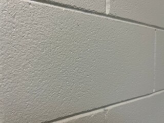Fototapeta premium White Painted Cinder Block Wall with Perspective