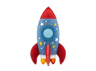 Fototapeta premium A vibrant plush toy rocket soars through a starry night sky with a bold red nose and fins.
