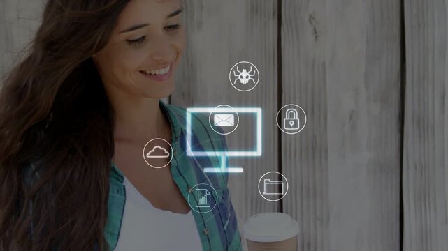 Woman tapping smartphone, sipping coffee while icons animating around monitor for data security