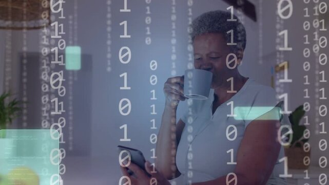 Senior woman checking notifications while sipping mug, causing tech overlay obscuring then fading