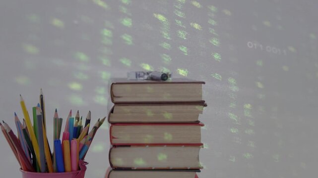 Exposure ramping revealing stacked books while green circuit overlay shifting, showing pencils