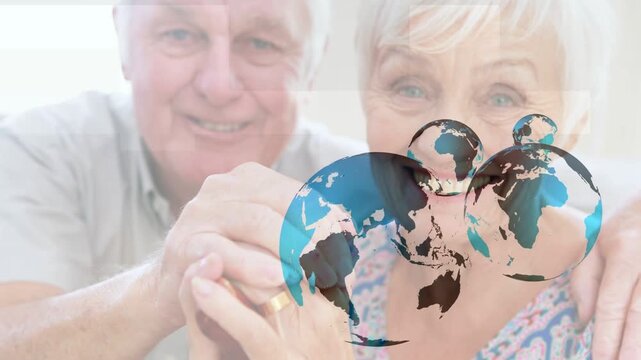 Senior couple holding cane with wedding ring as rotating globe fading revealing faces for health