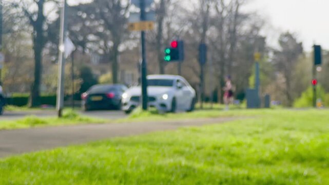 Traffic passing at junction. Clifton Downs, Bristol, UK