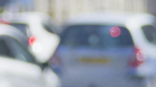 Traffic passing at junction on Black Boy Hill. Clifton Downs, Bristol, UK